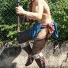 INDIEN QUI DANSE, TENANT SA HACHE DE GUERRE