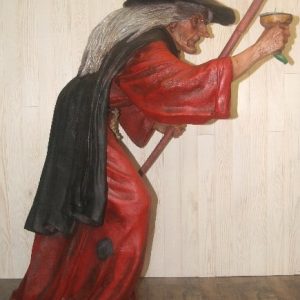 Statue d'une sorcière avec bâton et potion magique